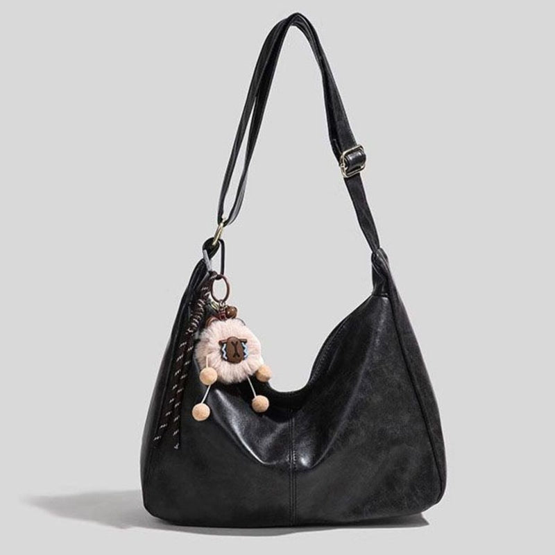 Vintage style leather hobo bag front view