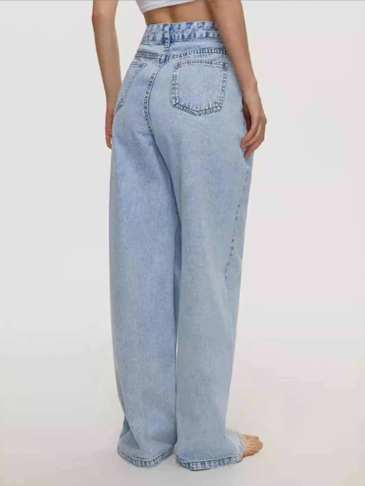 Full length styling of classic wide leg jeans