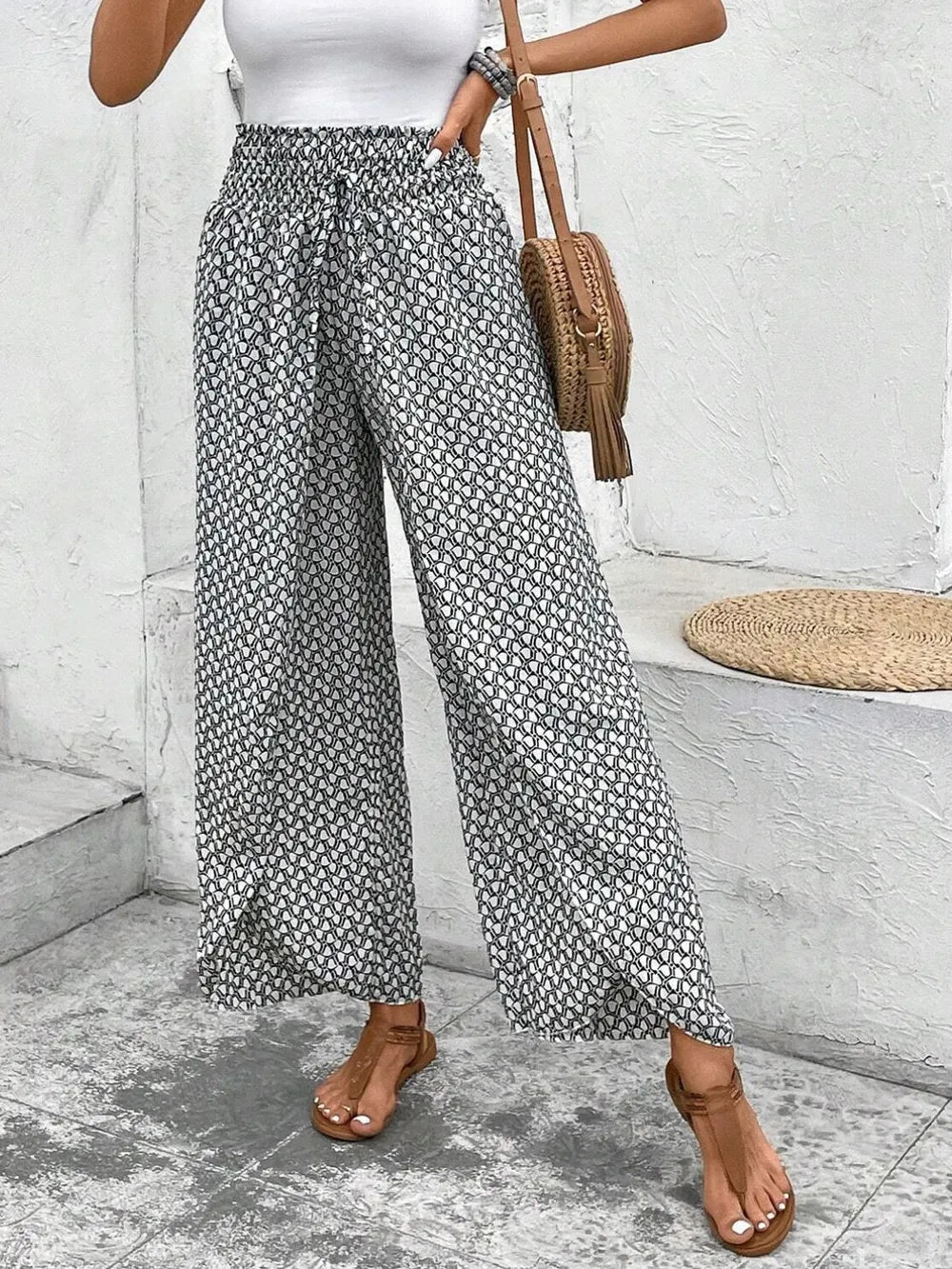 Tie waist wide leg pants hem detail