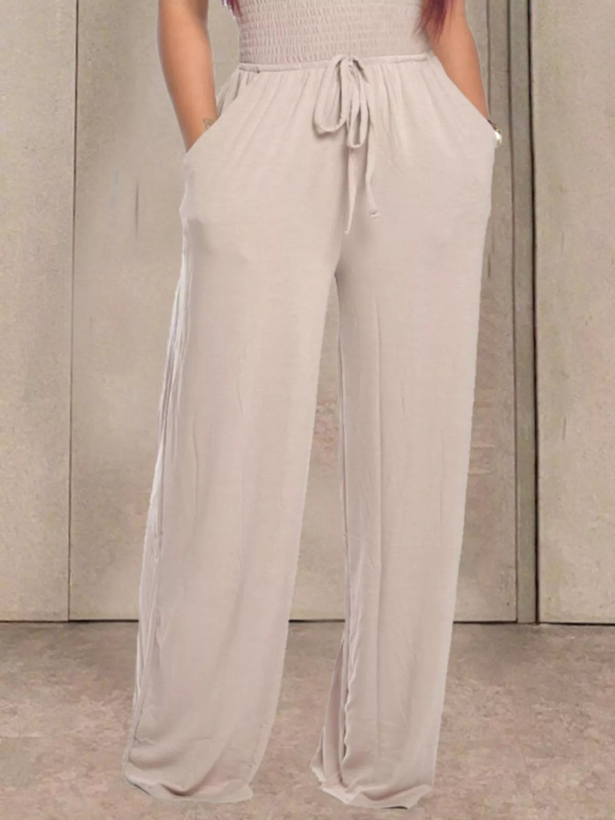 Strapless smocked wide leg jumpsuit angled full view
