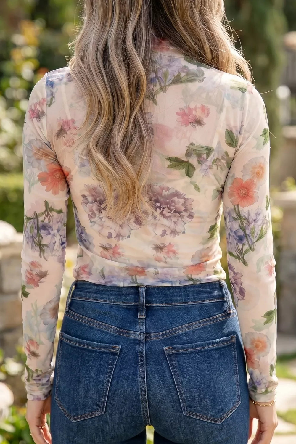 Floral mesh long sleeve top with thumbhole cuffs side view