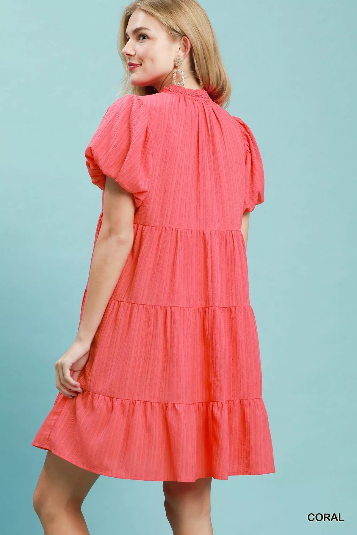 Coral puff sleeve tiered babydoll mini dress back view