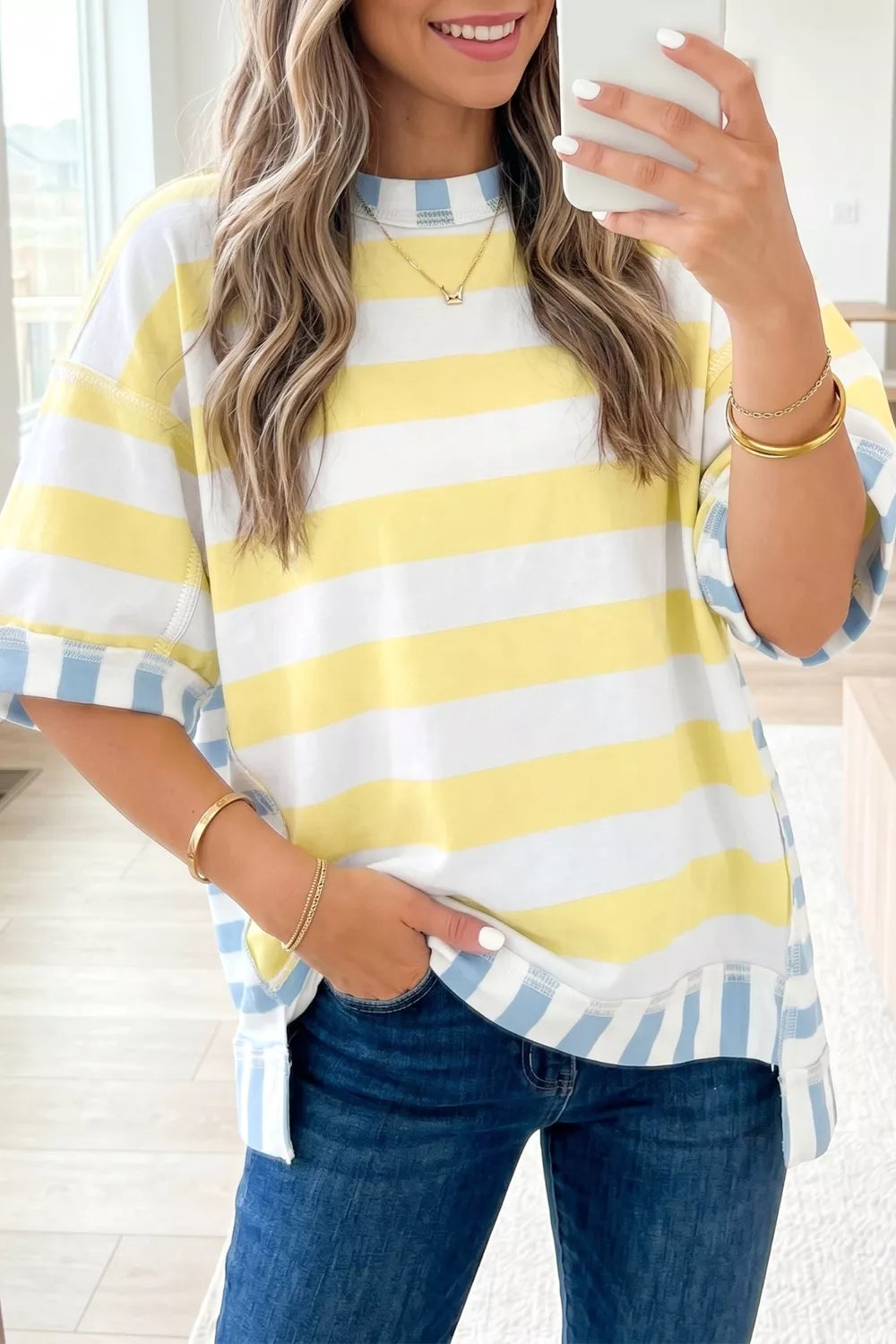 Light yellow striped casual top, close fabric detail