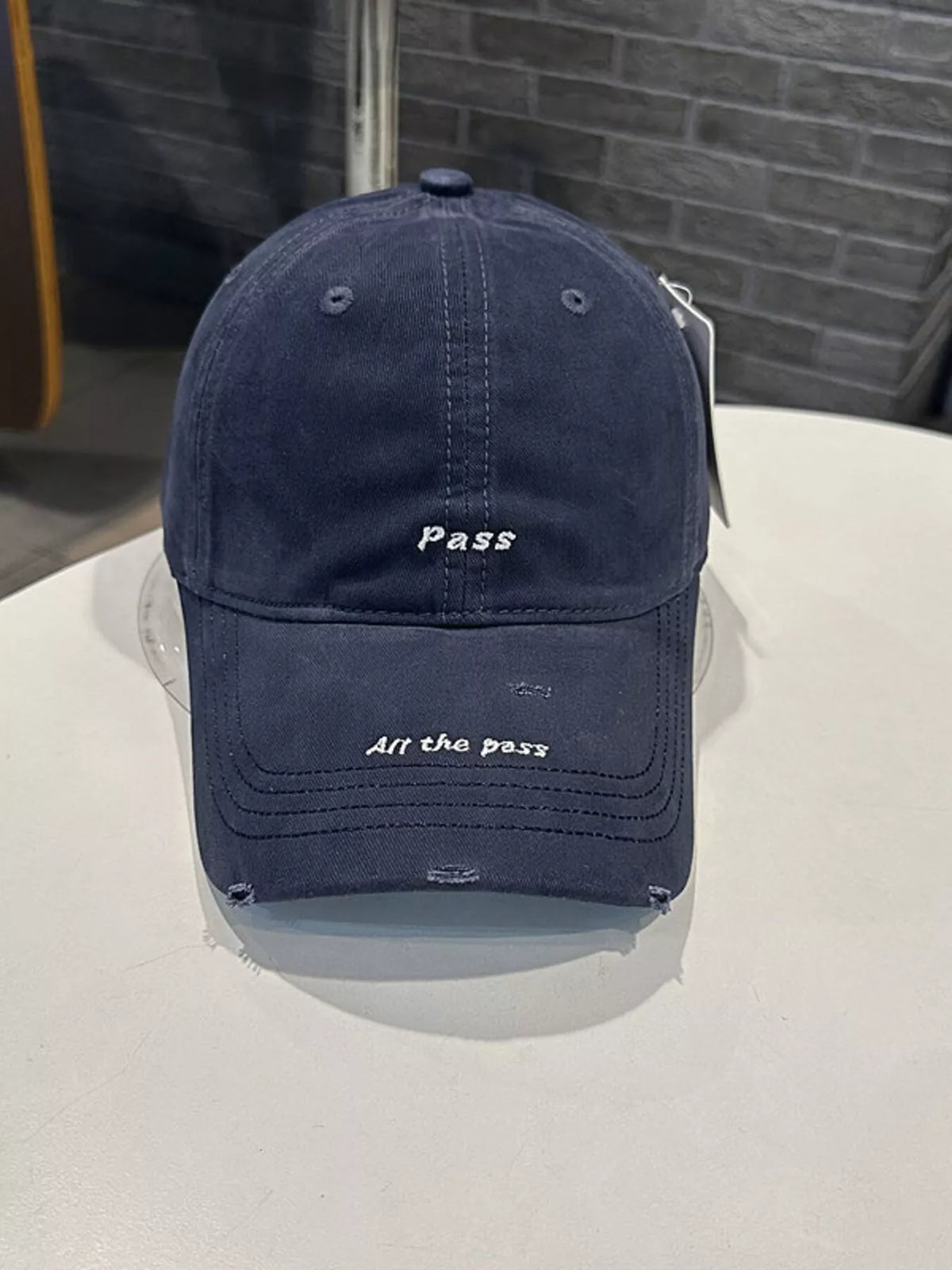 Distressed cotton baseball cap in navy blue front view