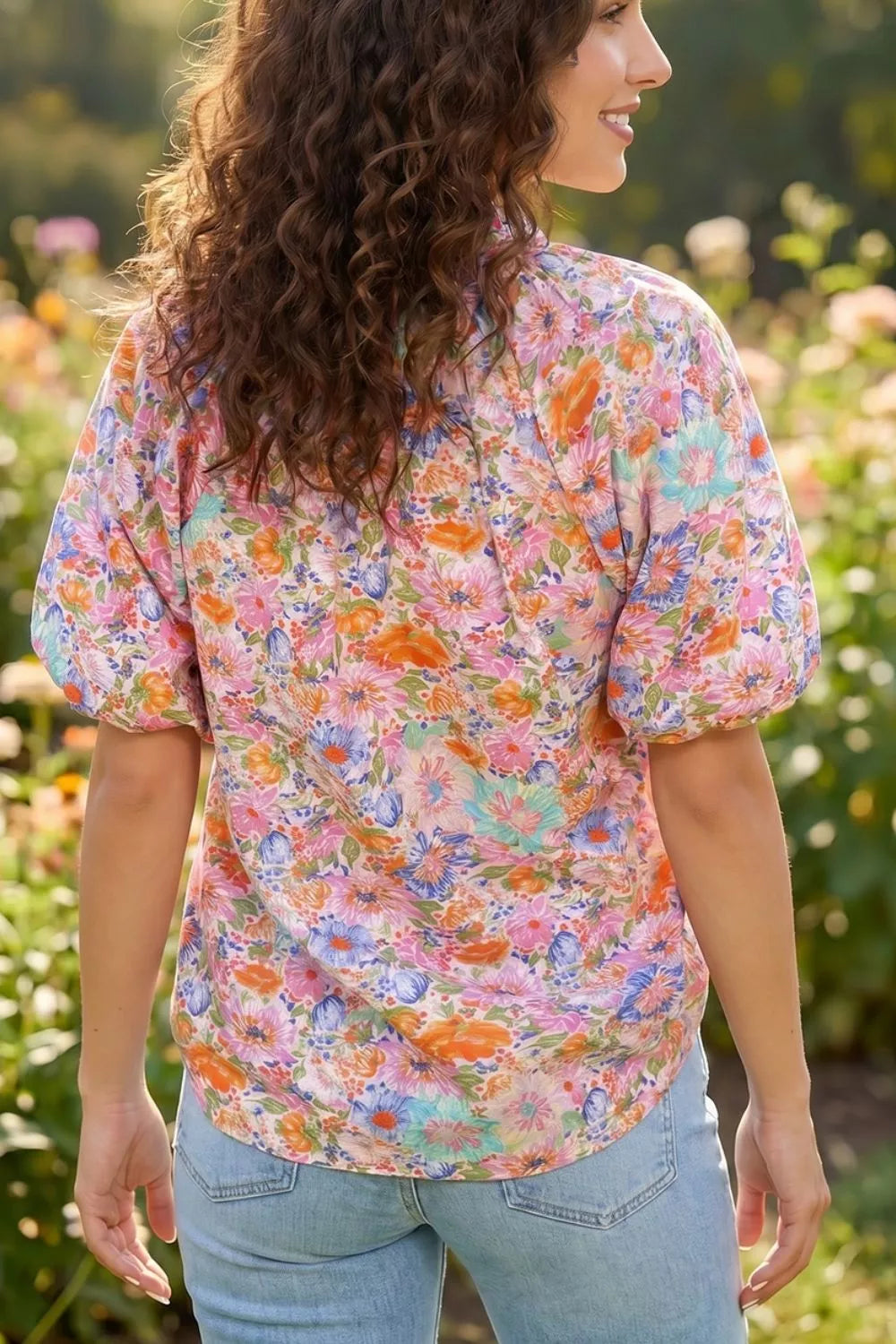 Puff sleeve detail on floral print blouse