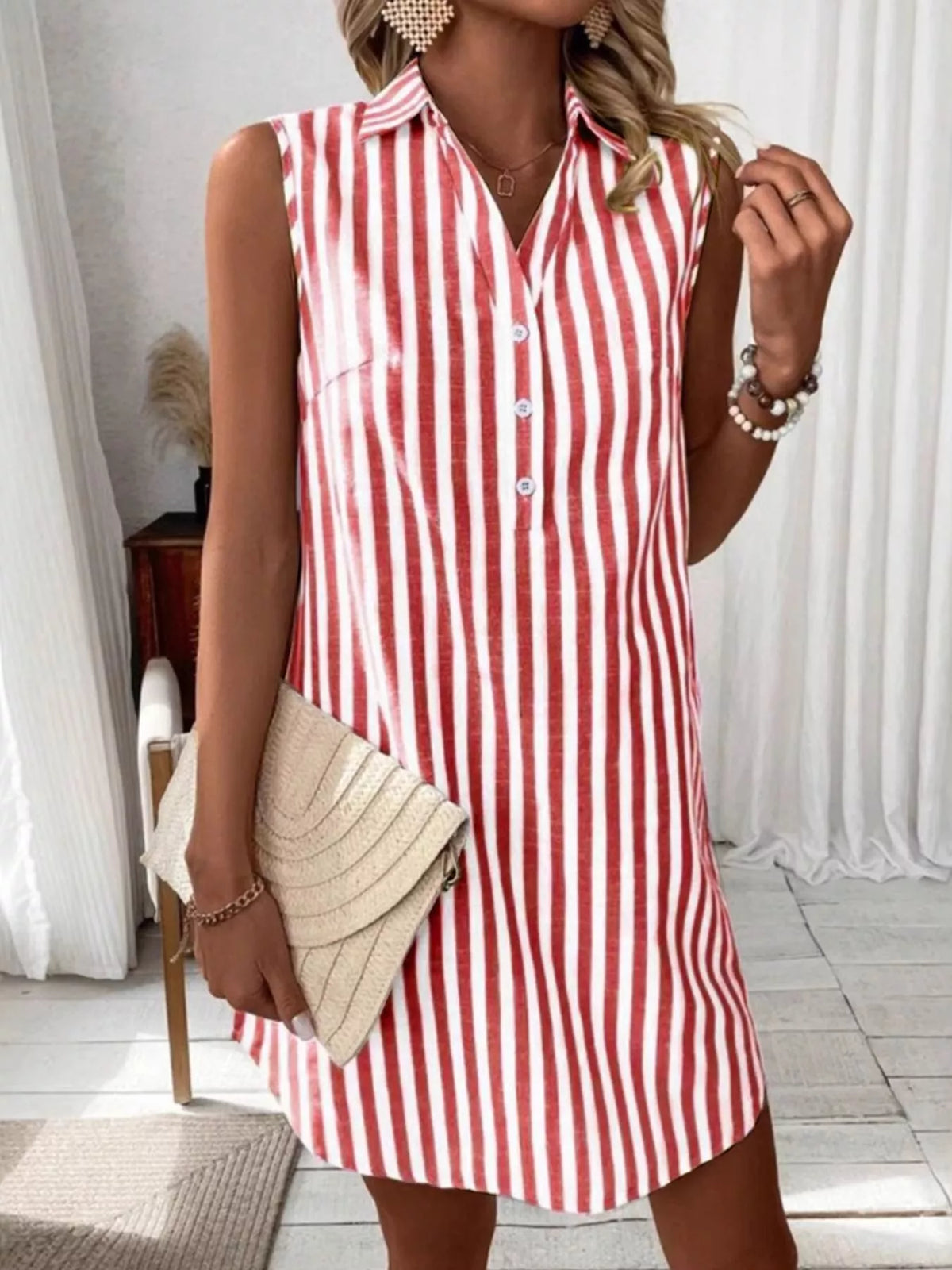 Blue striped sleeveless button front shirt dress front view