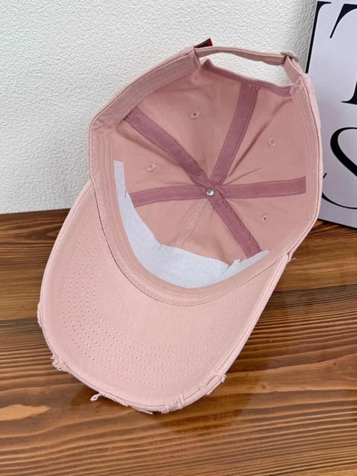 Back view of the baseball cap and strap