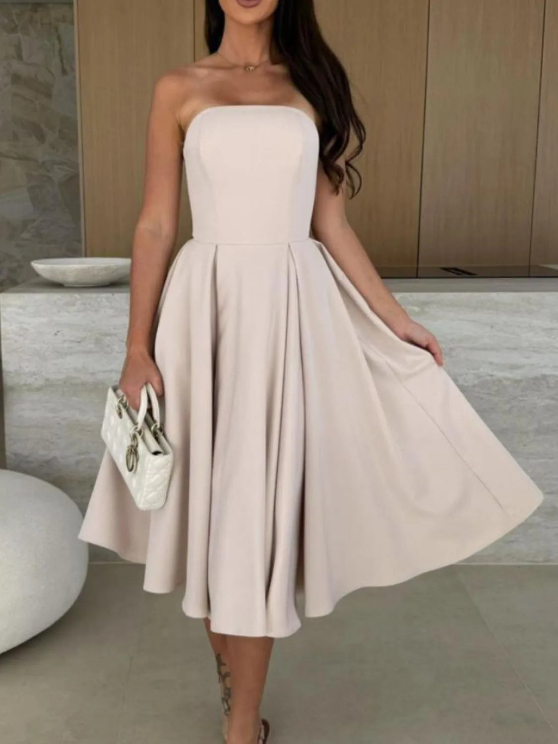 Strapless tube midi dress seated view