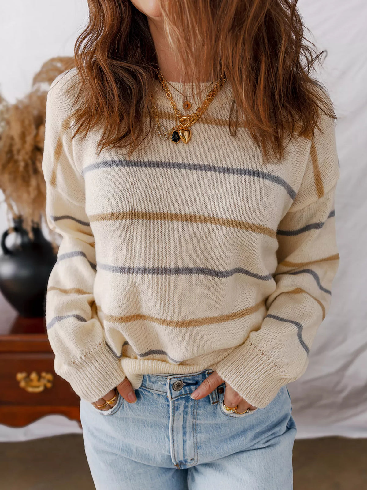 Striped ribbed drop shoulder sweater, side profile view