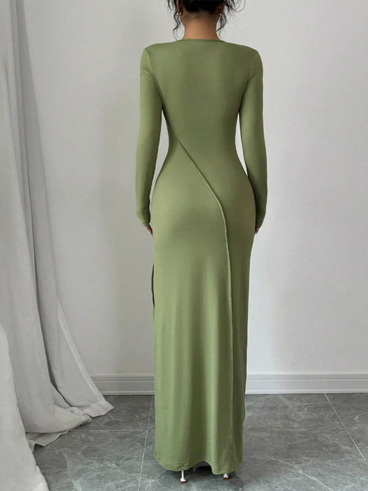 Green exposed seam long sleeve maxi dress detail of the neckline
