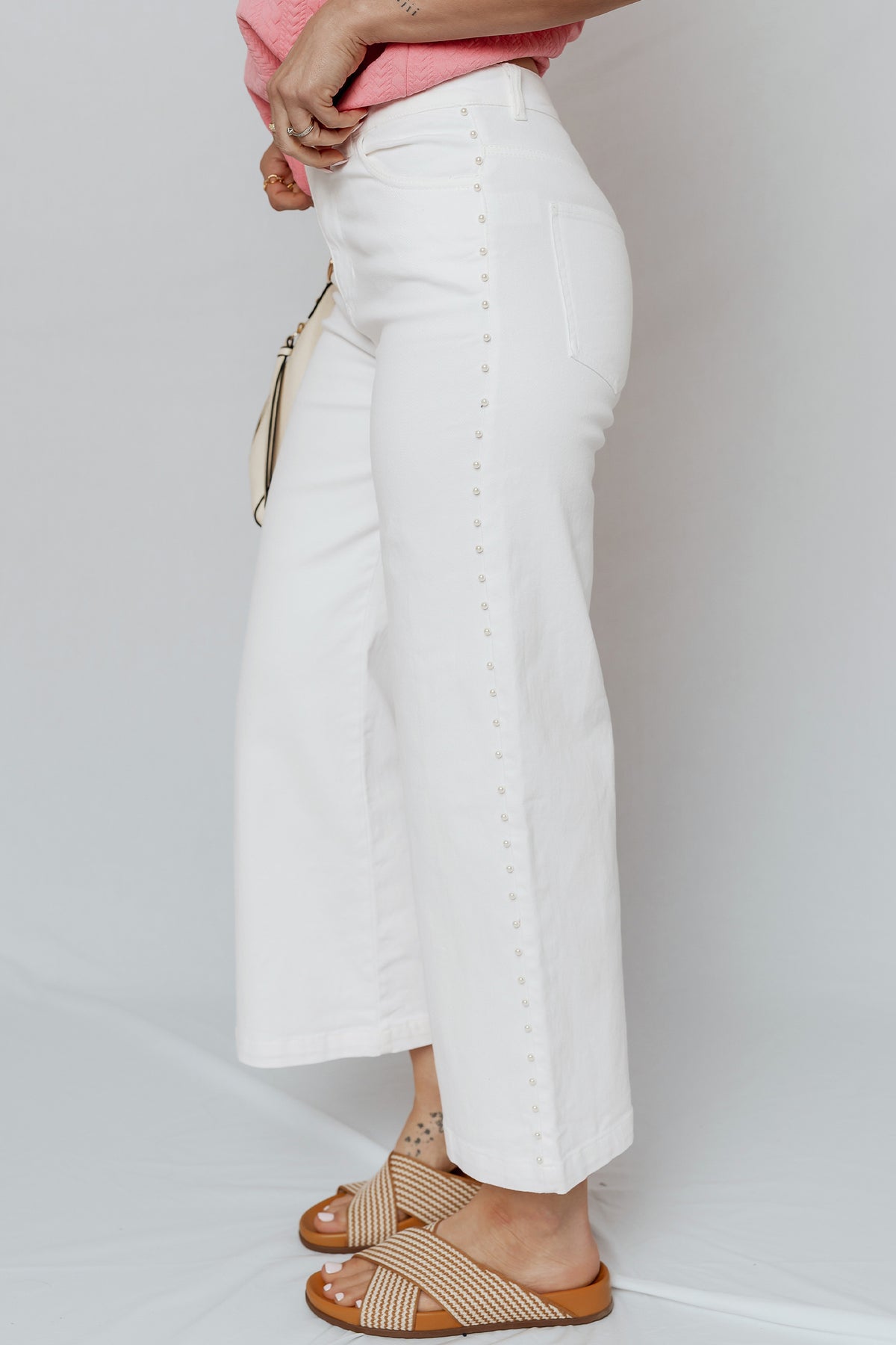 White pearl jeans back view