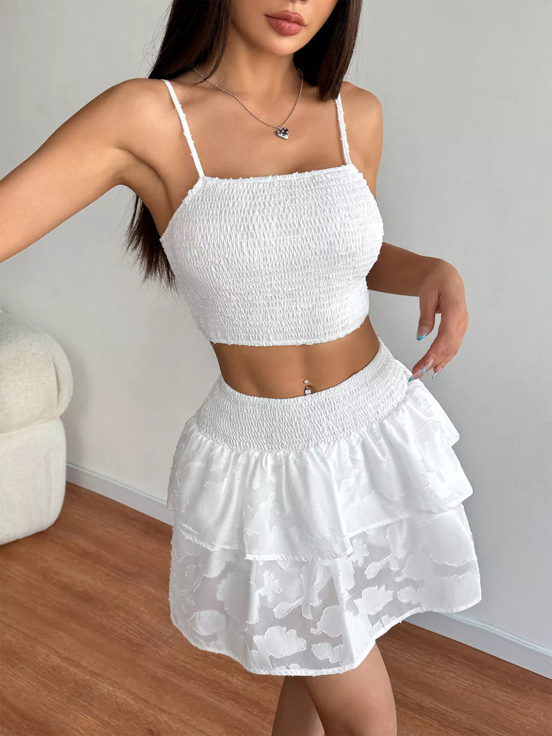 White smocked crop top and ruffle mini skirt set front view