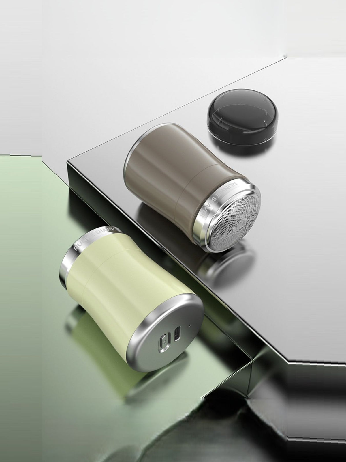 Portable electric shaver held in hand
