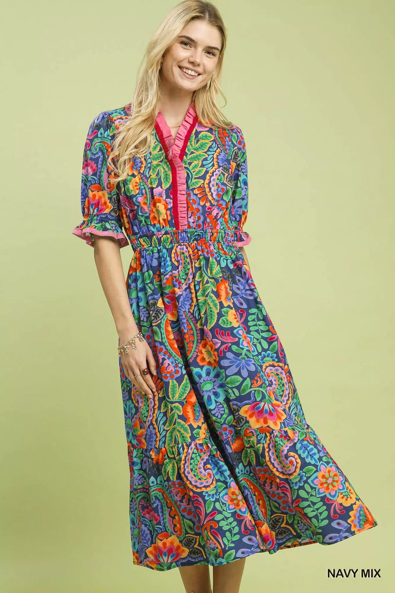 Navy mix floral midi dress with ruffle trim worn by a model