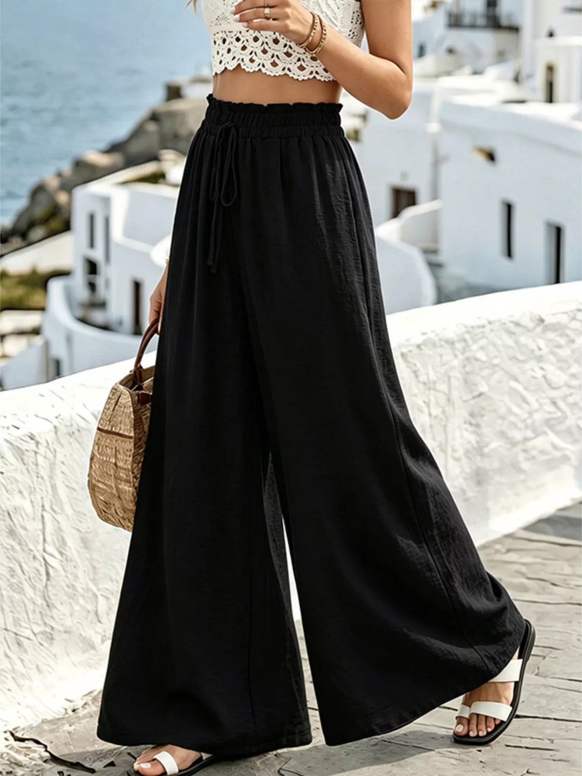 Waist tie detail on drawstring wide leg pants