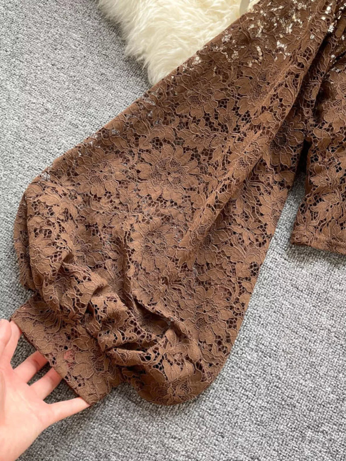 Lace tie back long sleeve top, close up detail