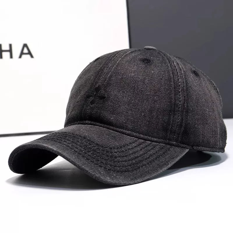 Denim embroidered baseball cap shown in one of three available colors