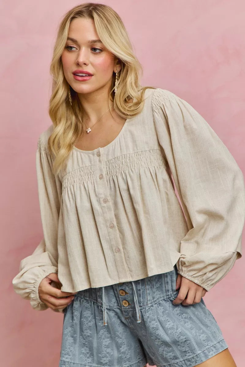 Cream linen blend smocked long sleeve top, front view
