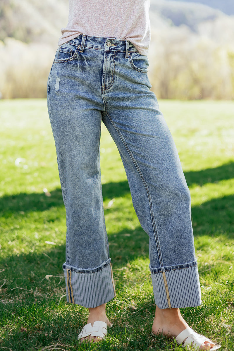 Blue cuffed straight leg loose jeans front view