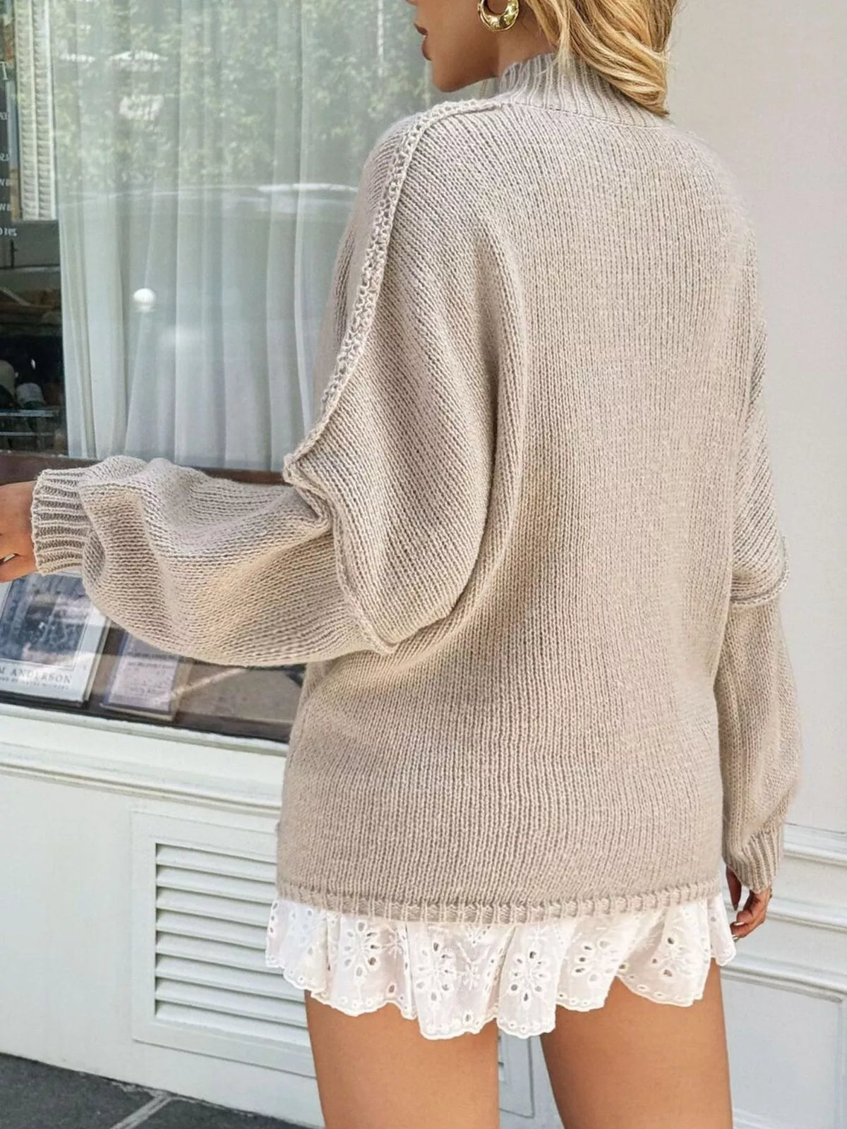 mock neck drop shoulder sweater side profile view