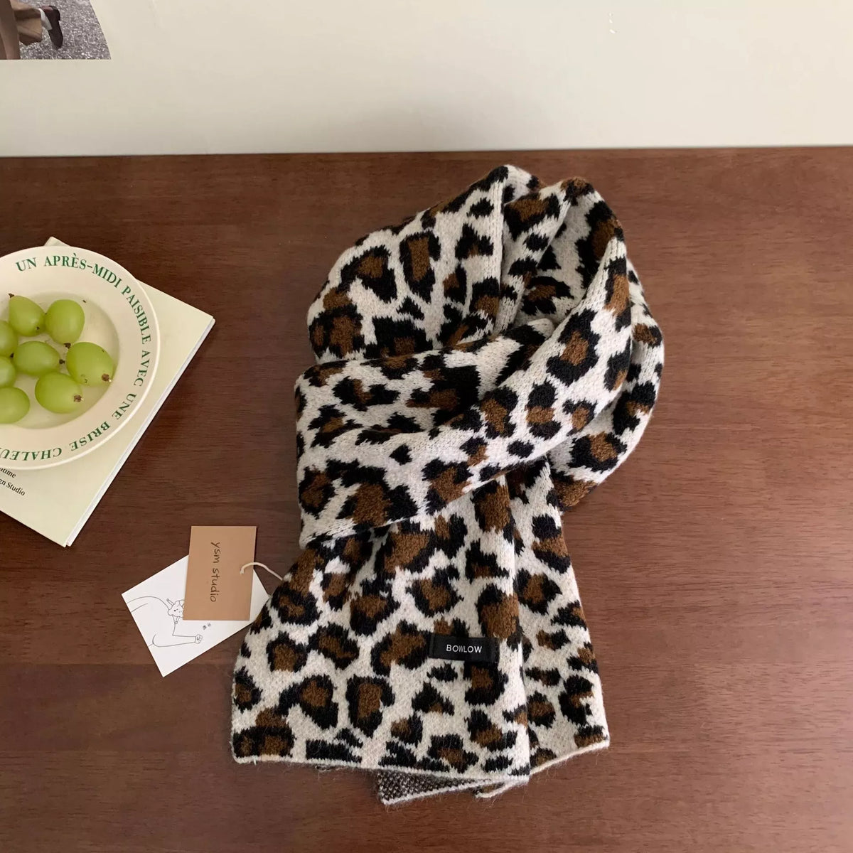 Animal print plush winter scarf laid flat to show print