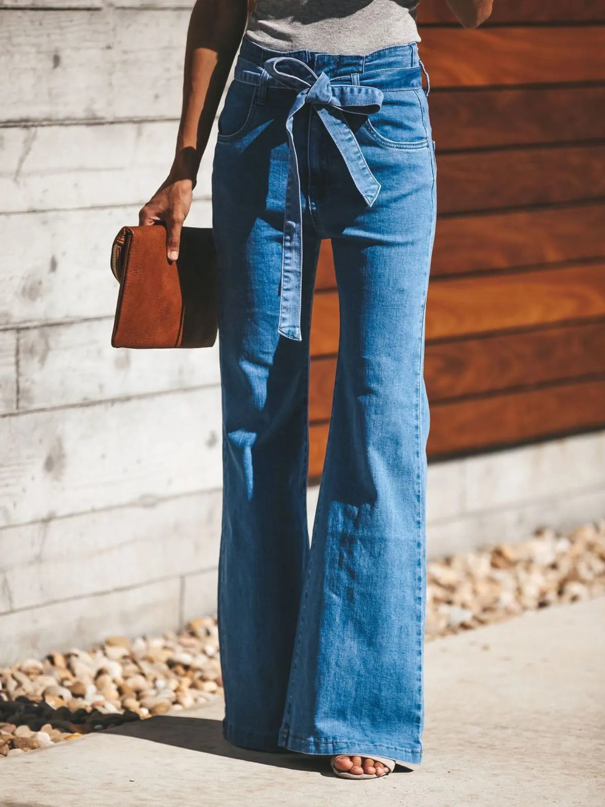 High waist tie front flare jeans in light blue front view
