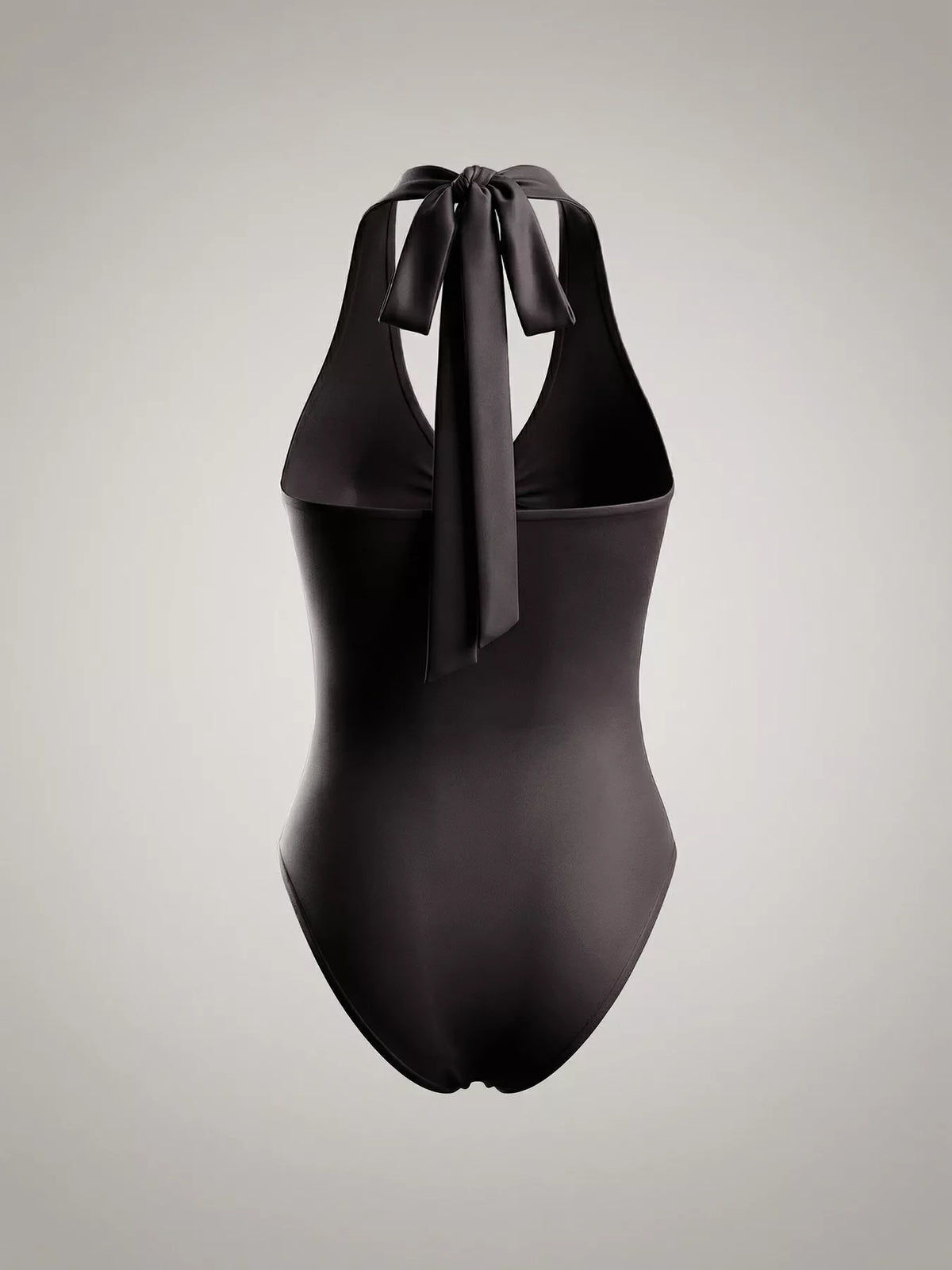 Halter neckline and tie detail of the bodysuit