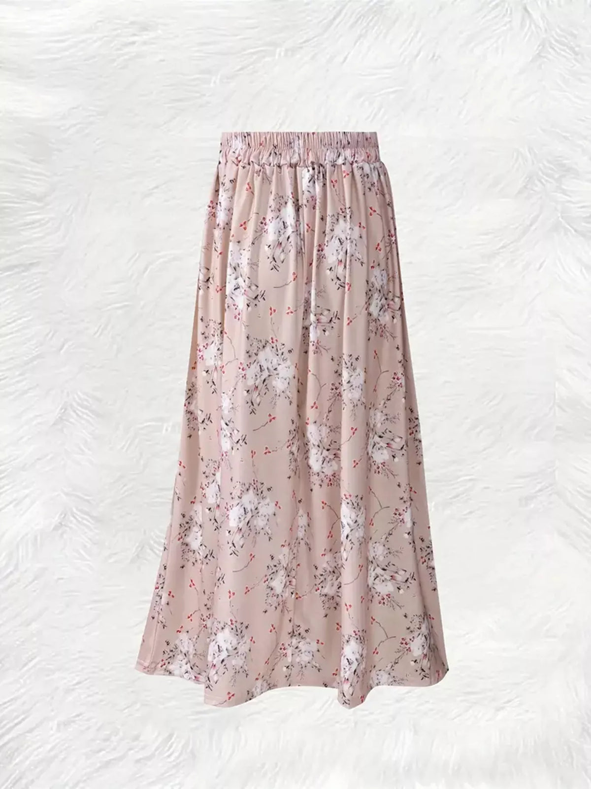 Printed midi skirt styled with a plain tucked in top