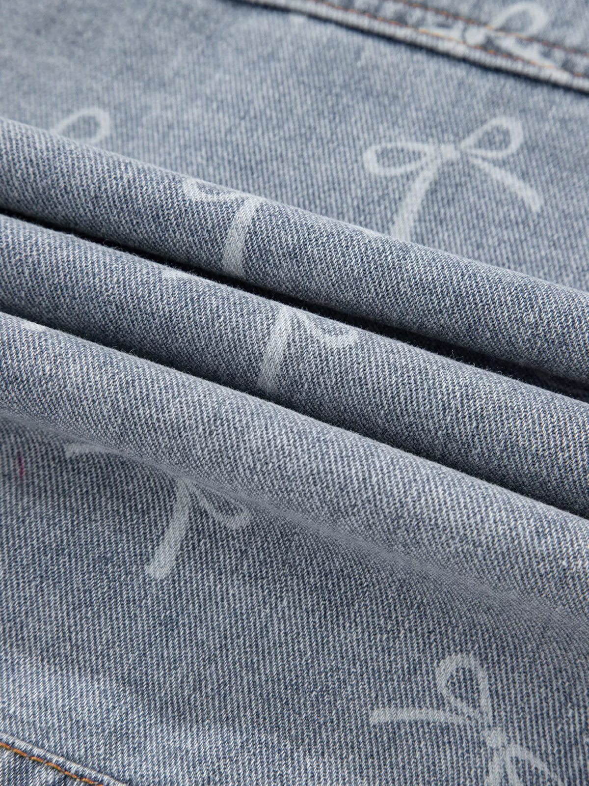 Bow Print Raw Hem Denim Jacket in Light Wash view 12