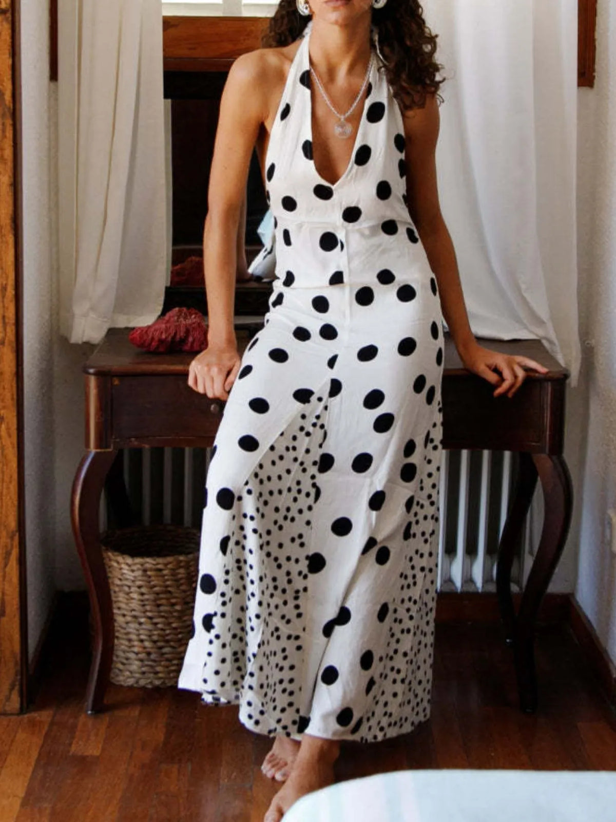 Backless halter polka dot maxi dress front view