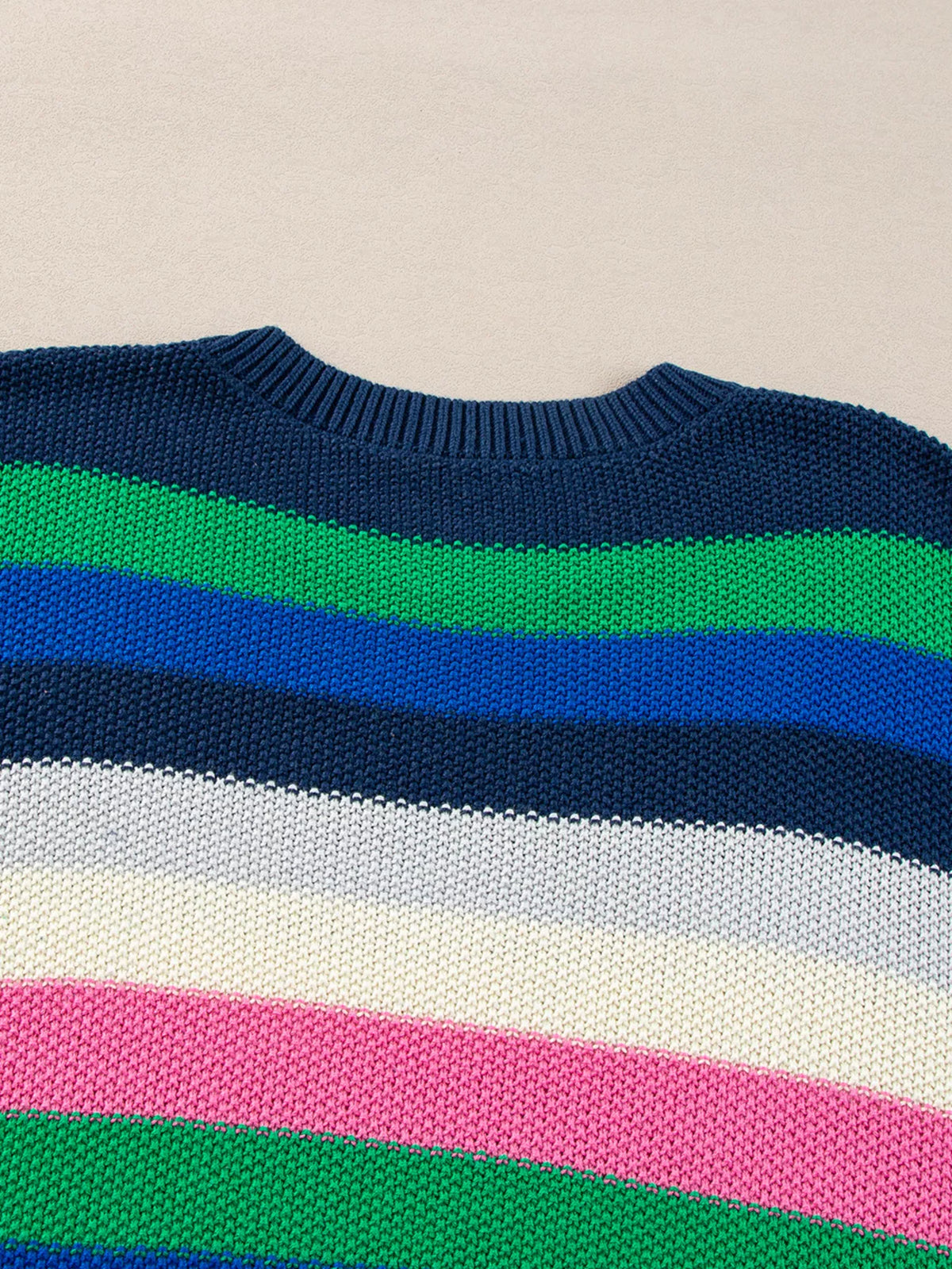 rainbow striped crew neck sweater close up of the neckline