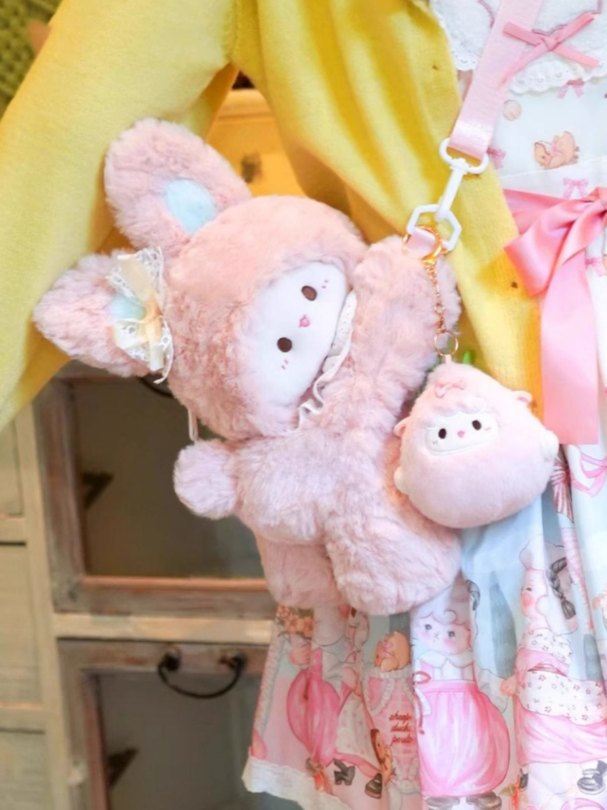 Blush pink plush bunny backpack side profile