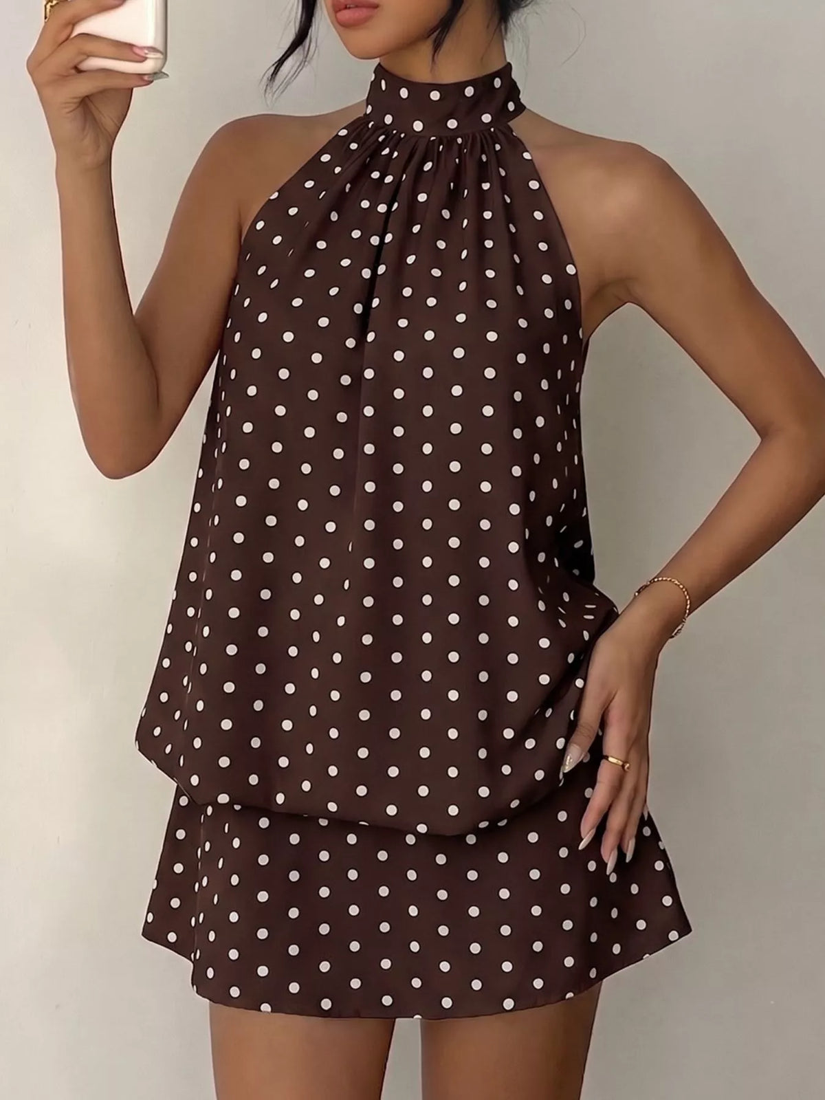 Polka dot halter dress in coffee brown side view