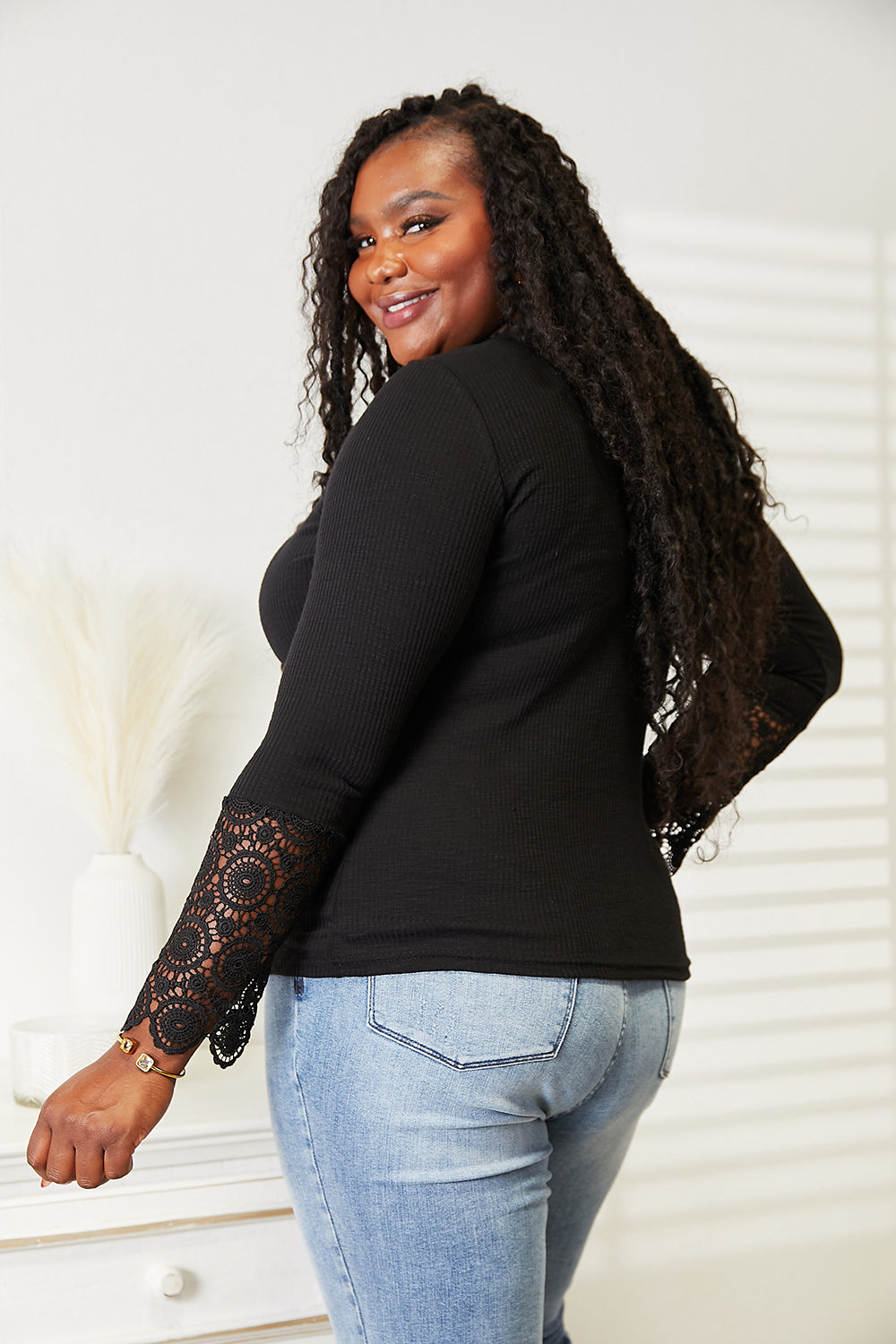Detail of the button front and lace hem trim