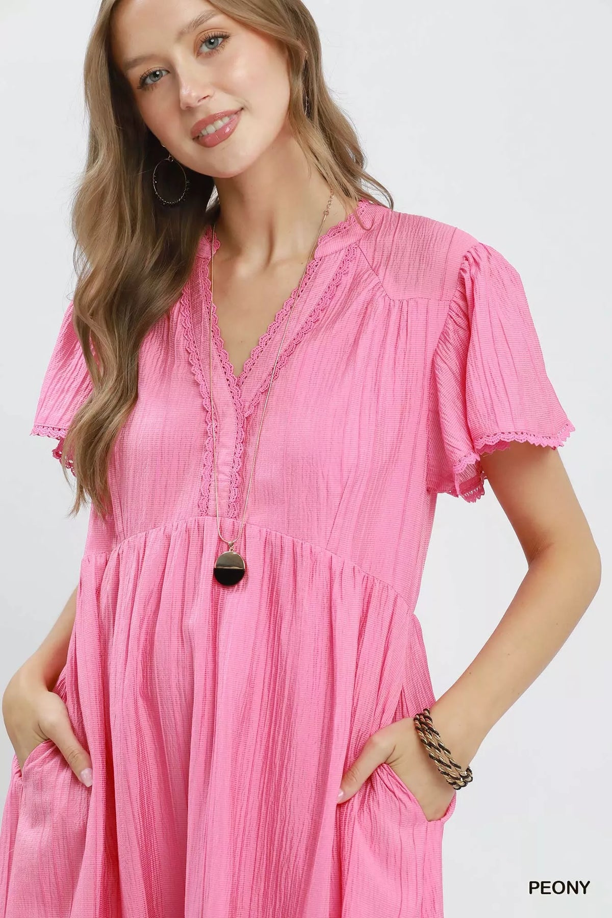 Peony pink tiered midi dress side pocket detail view