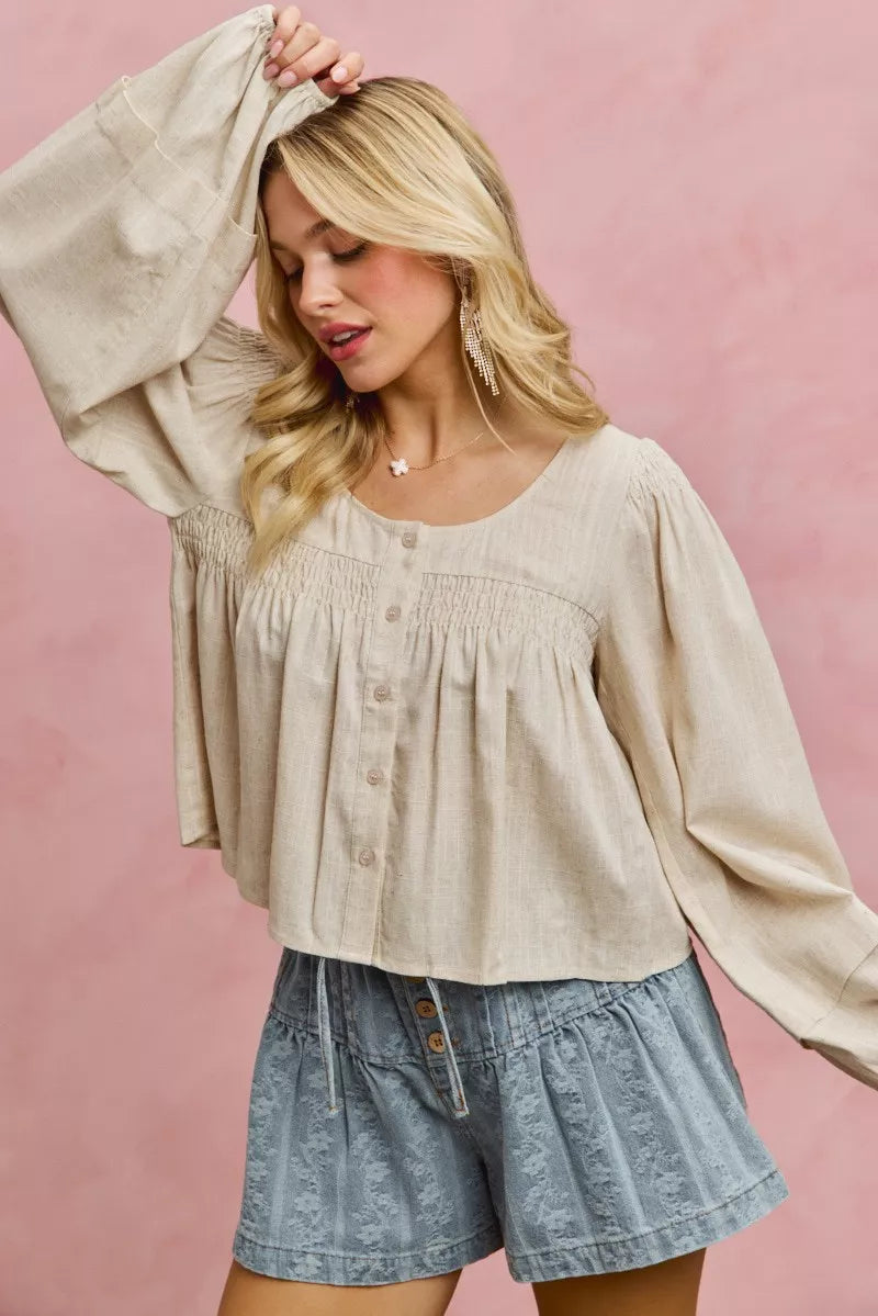 Cream linen blend smocked long sleeve top, detail view