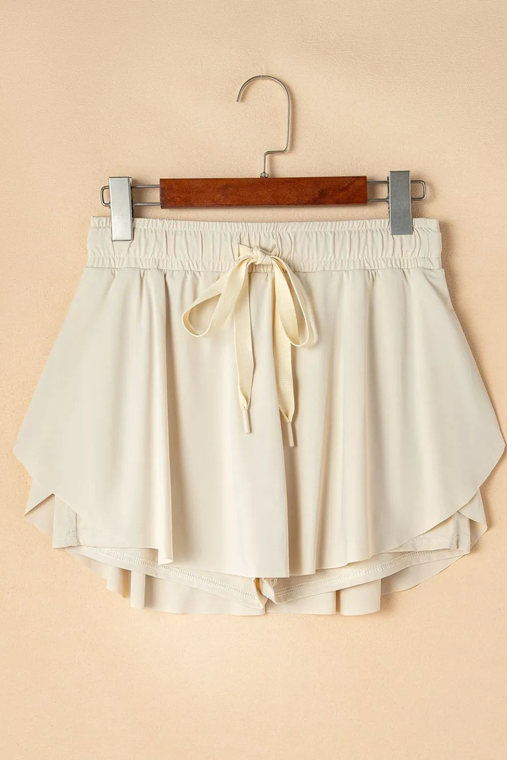 Drawstring high waist lined active skort movement and fit view