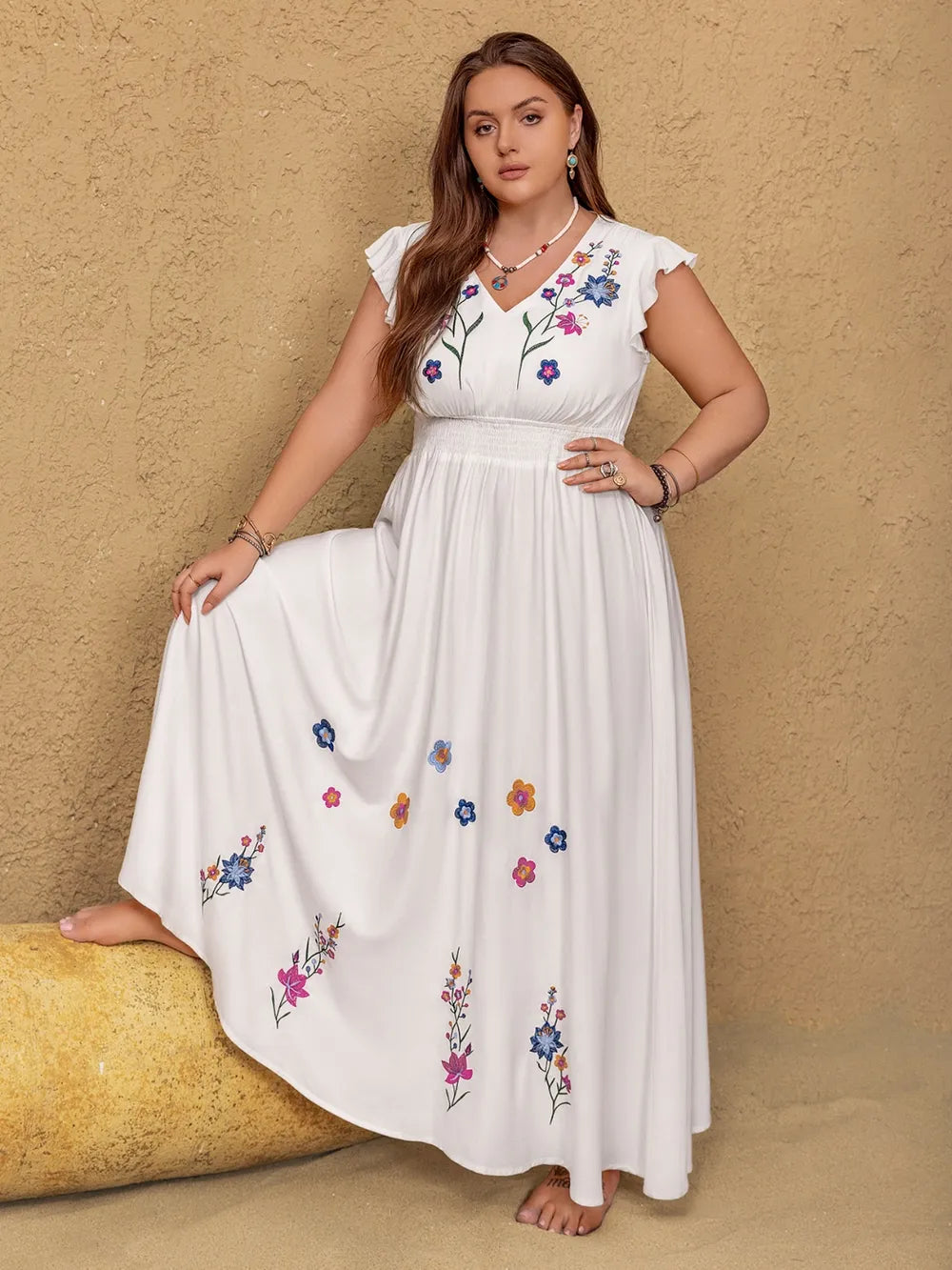 Plus size embroidered floral v neck maxi dress in white back view