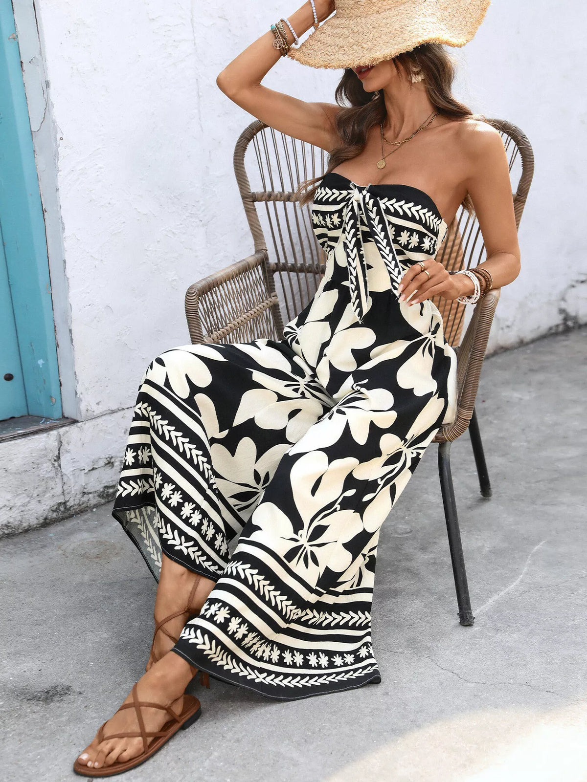 Strapless neckline detail on the floral jumpsuit