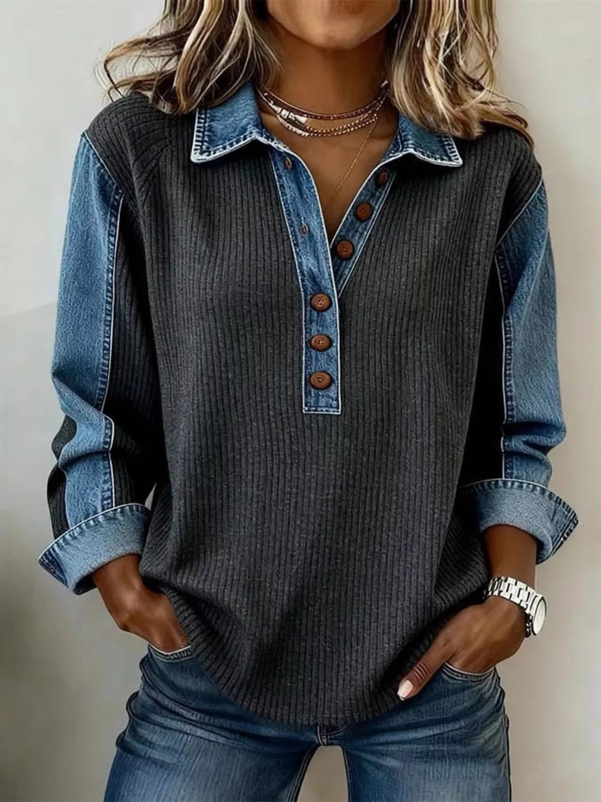 Model wearing the button detail sweatshirt in a front view