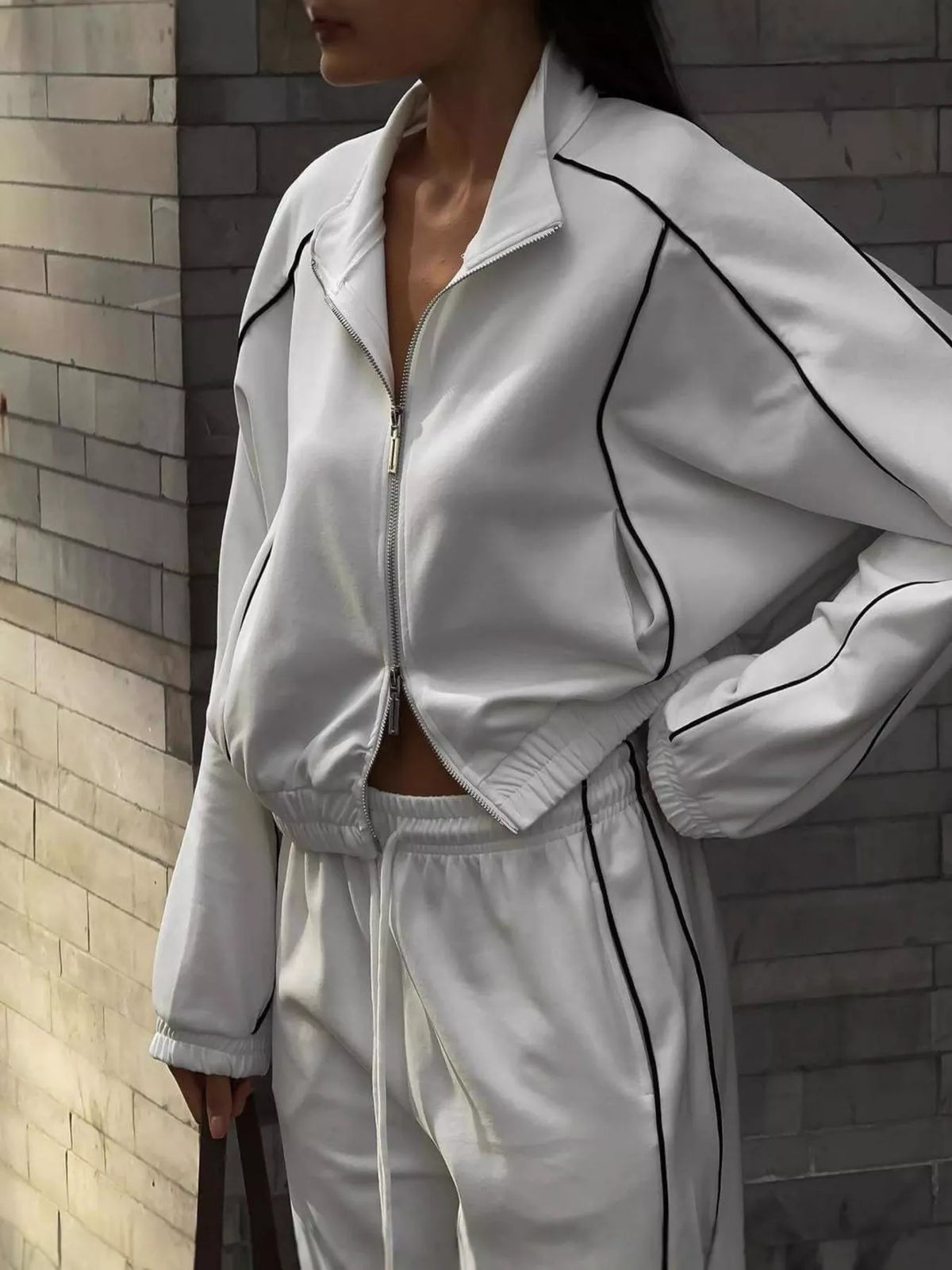 Zip up outerwear and joggers two piece set side detail