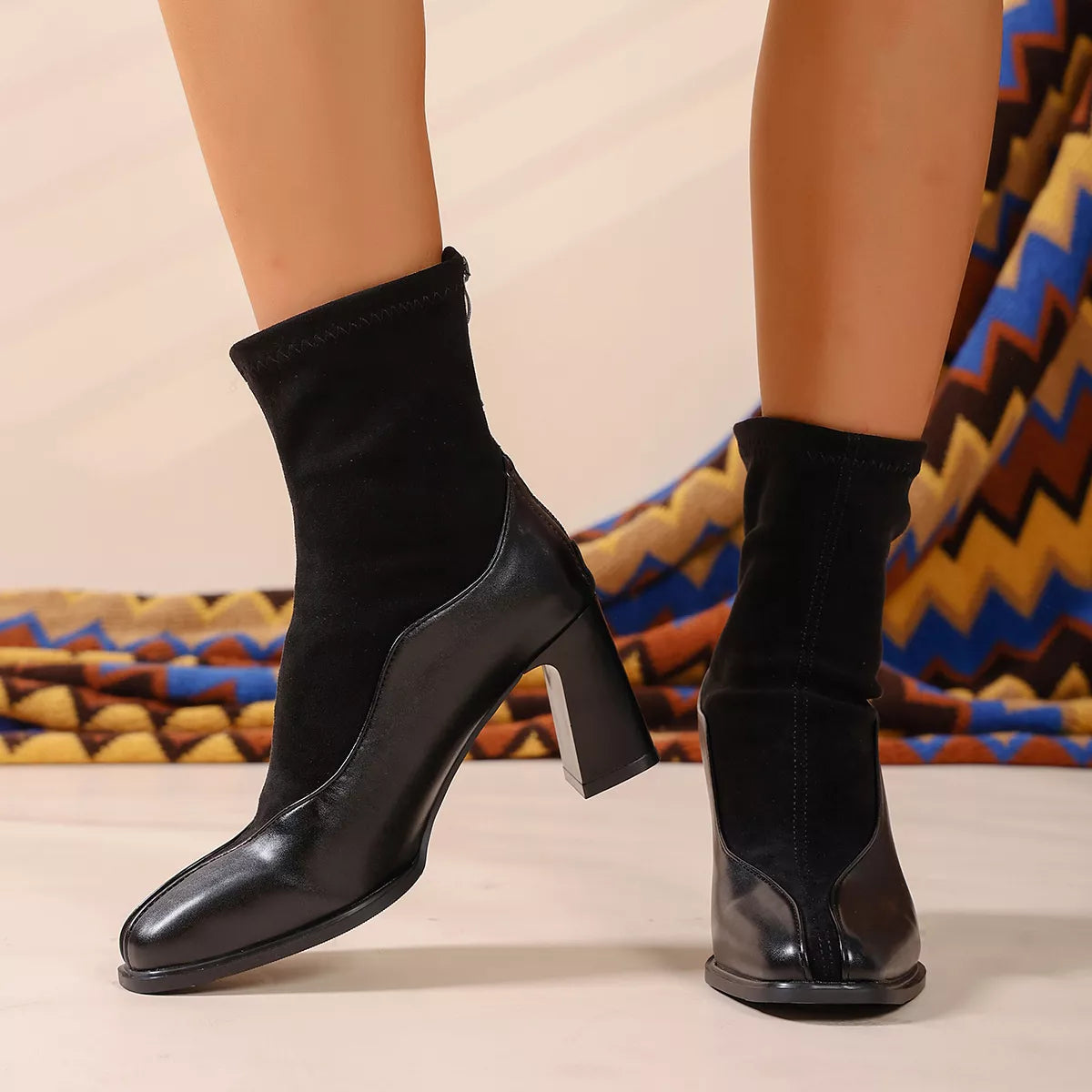 Square toe block heel boots styled with denim