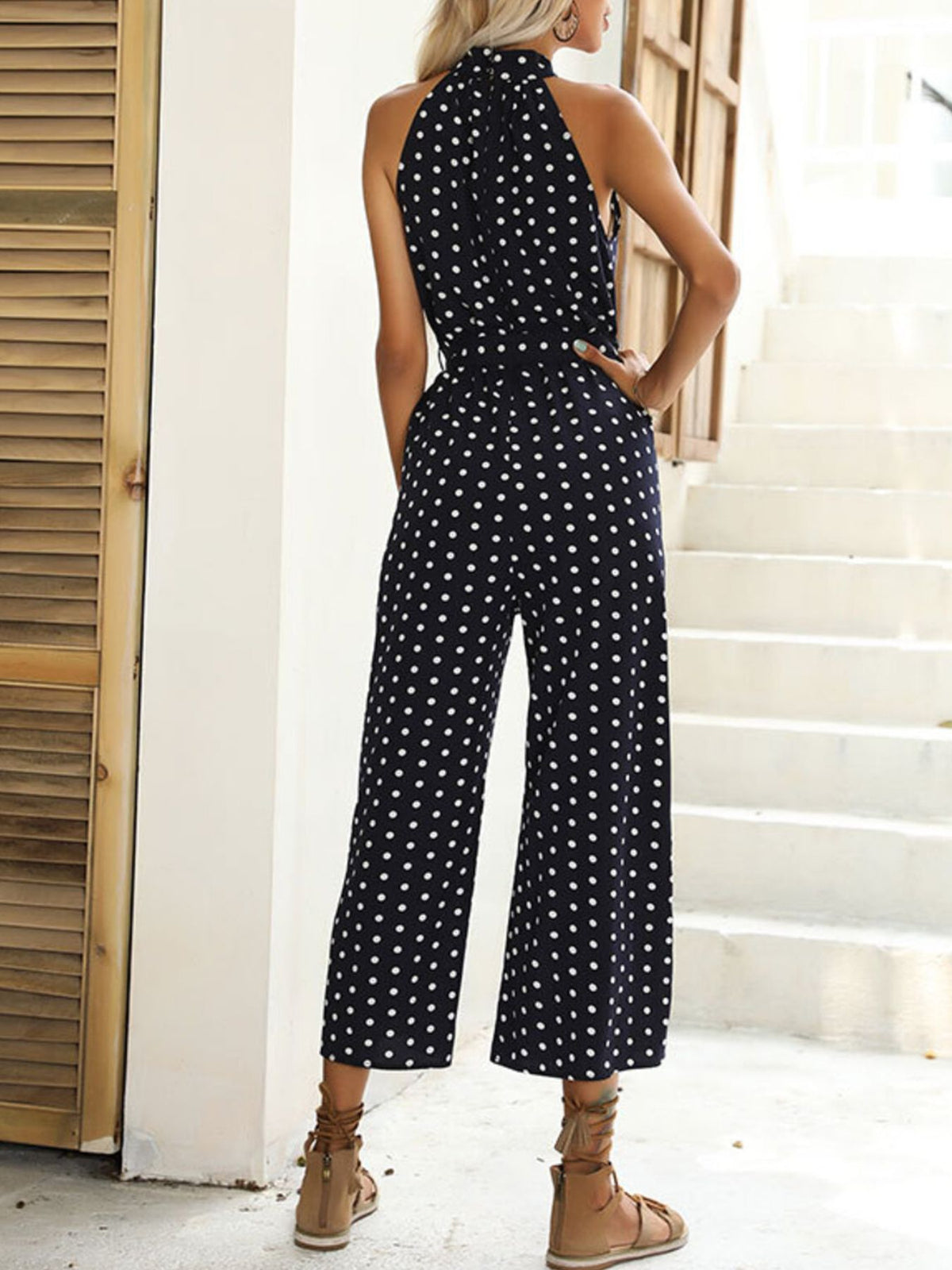 Full length view of the halter neck wide leg jumpsuit