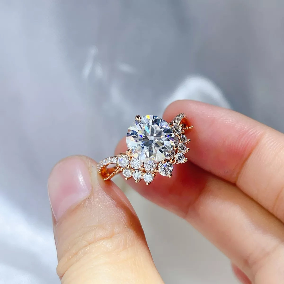 Close up of the moissanite stone in the gold tone setting