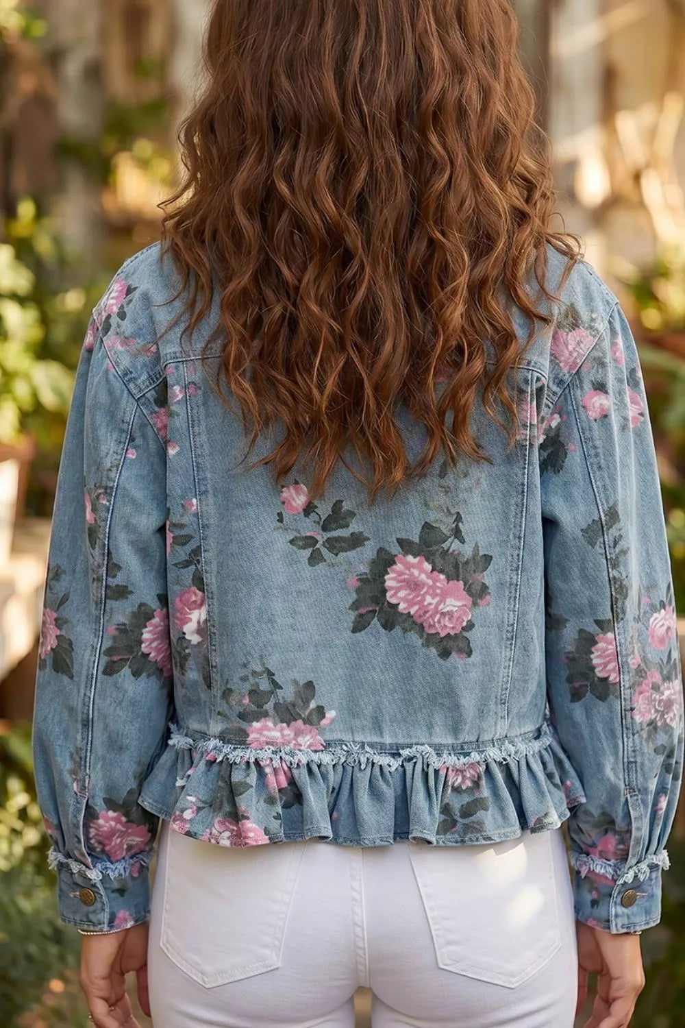 Ruffle hem denim jacket styled open over a white top