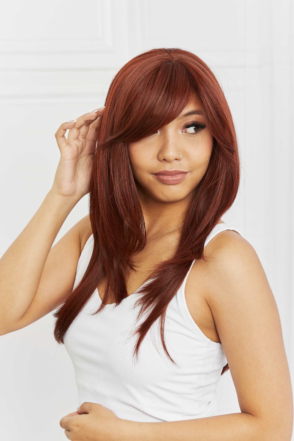 Red mid length wavy synthetic wig front view