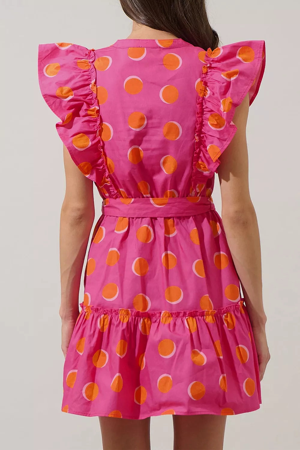 Ruffle sleeve detail on polka dot mini dress