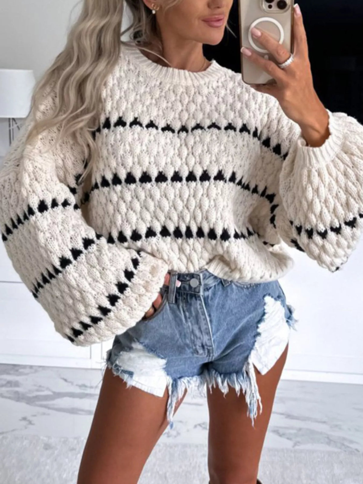 Oversized striped sweater dropped shoulder styling