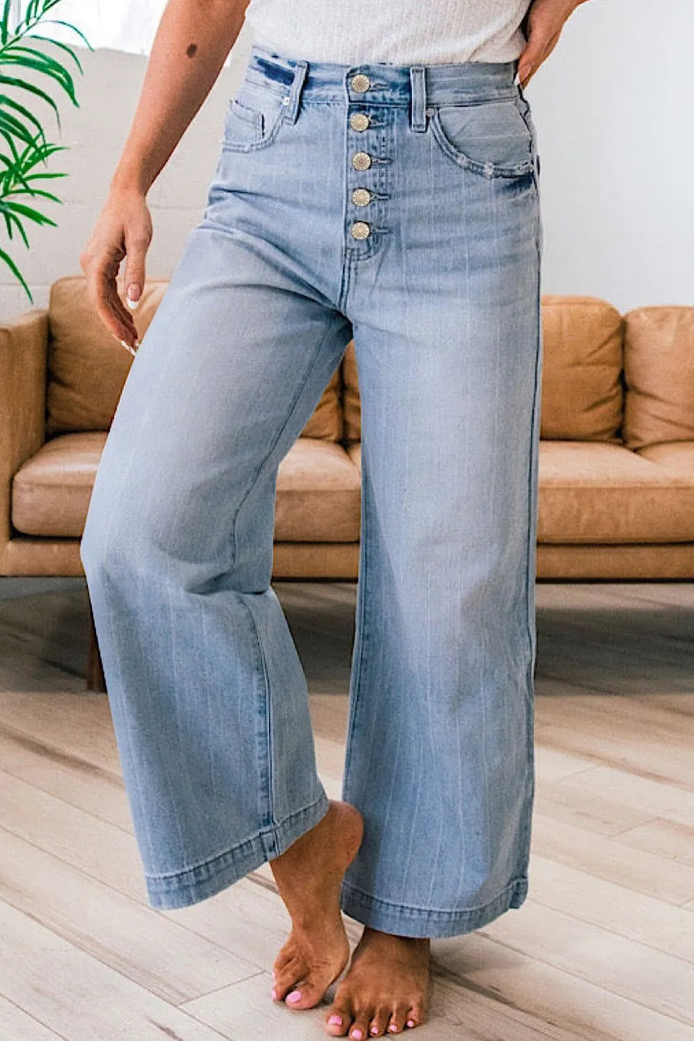 Medium wash wide leg jeans side view