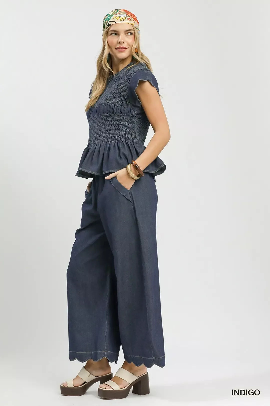 Indigo chambray peplum top scalloped hem detail